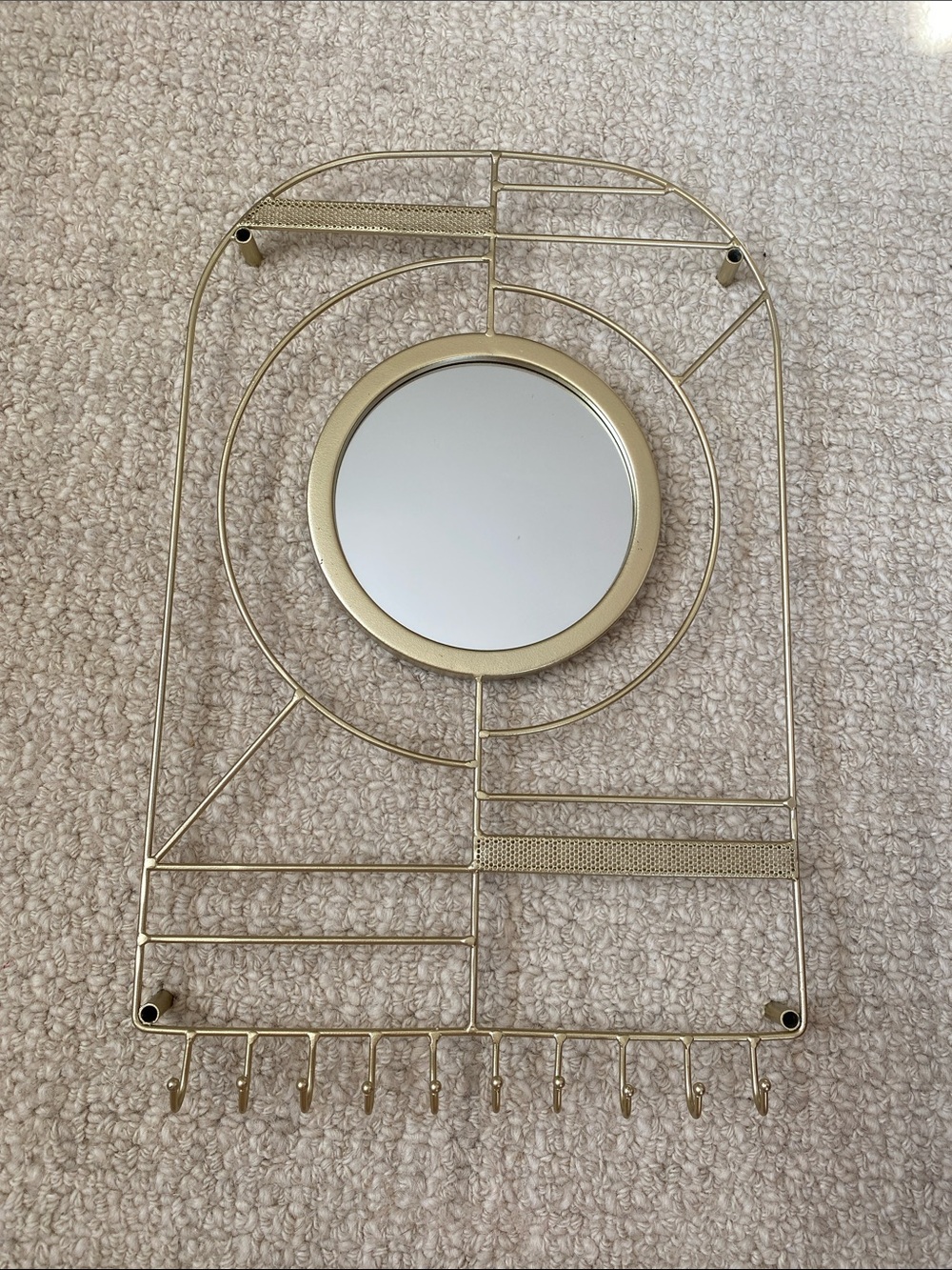 Gold Metal Wall Mirror with Jewelry Organizer